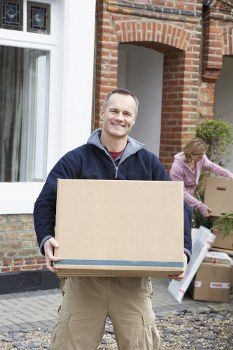 Packed boxes and furniture ready for transport in a local move