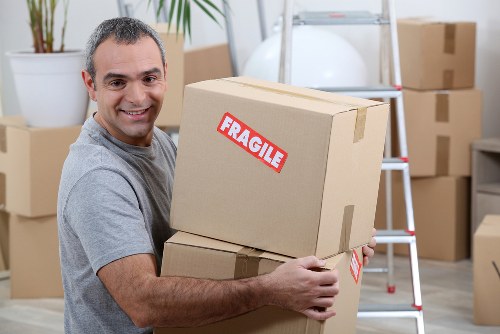 Office relocation team loading boxes and desks for East Dulwich business move