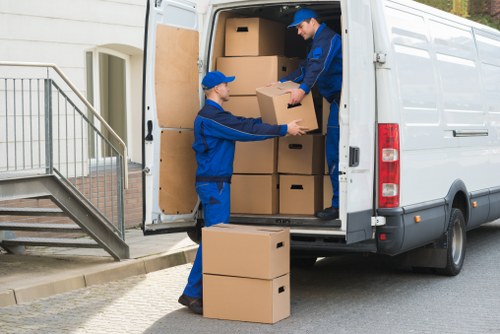 Careful loading of household items into a moving van