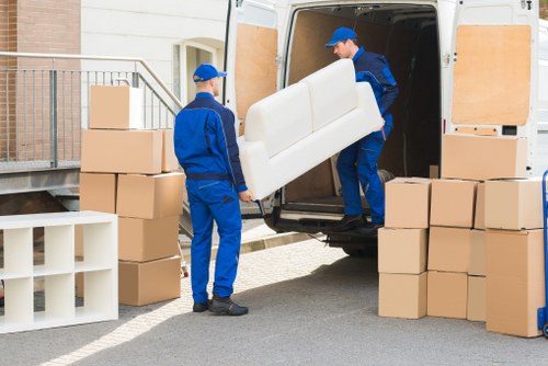 Moving team using safe lifting and planning procedures