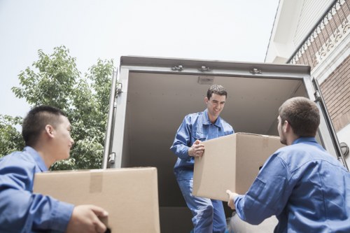 Man with van loading service in a residential setting