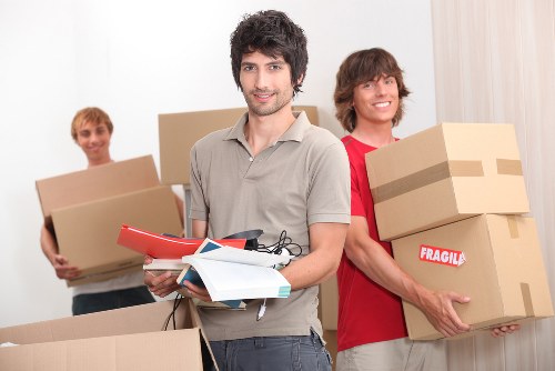 Transport of household items by a van moving team