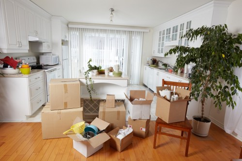Van being loaded with boxes and furniture for a local move