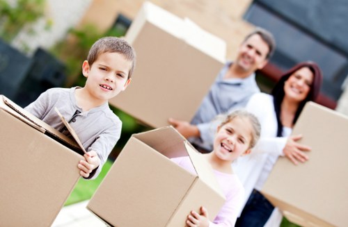 Small local moving team handling boxes and furniture in East Dulwich