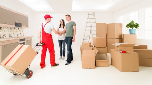 Packed boxes and prepared rooms ready for a move in East Dulwich