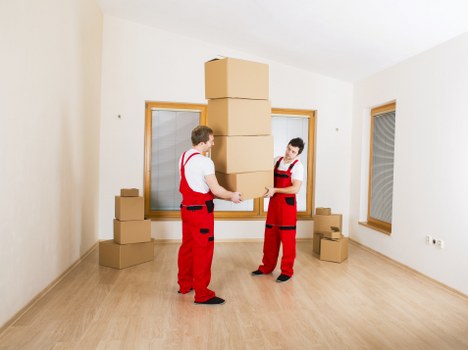 Removal van and team planning a move on a residential street in East Dulwich