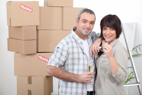 Removal team loading boxes and furniture for a local move